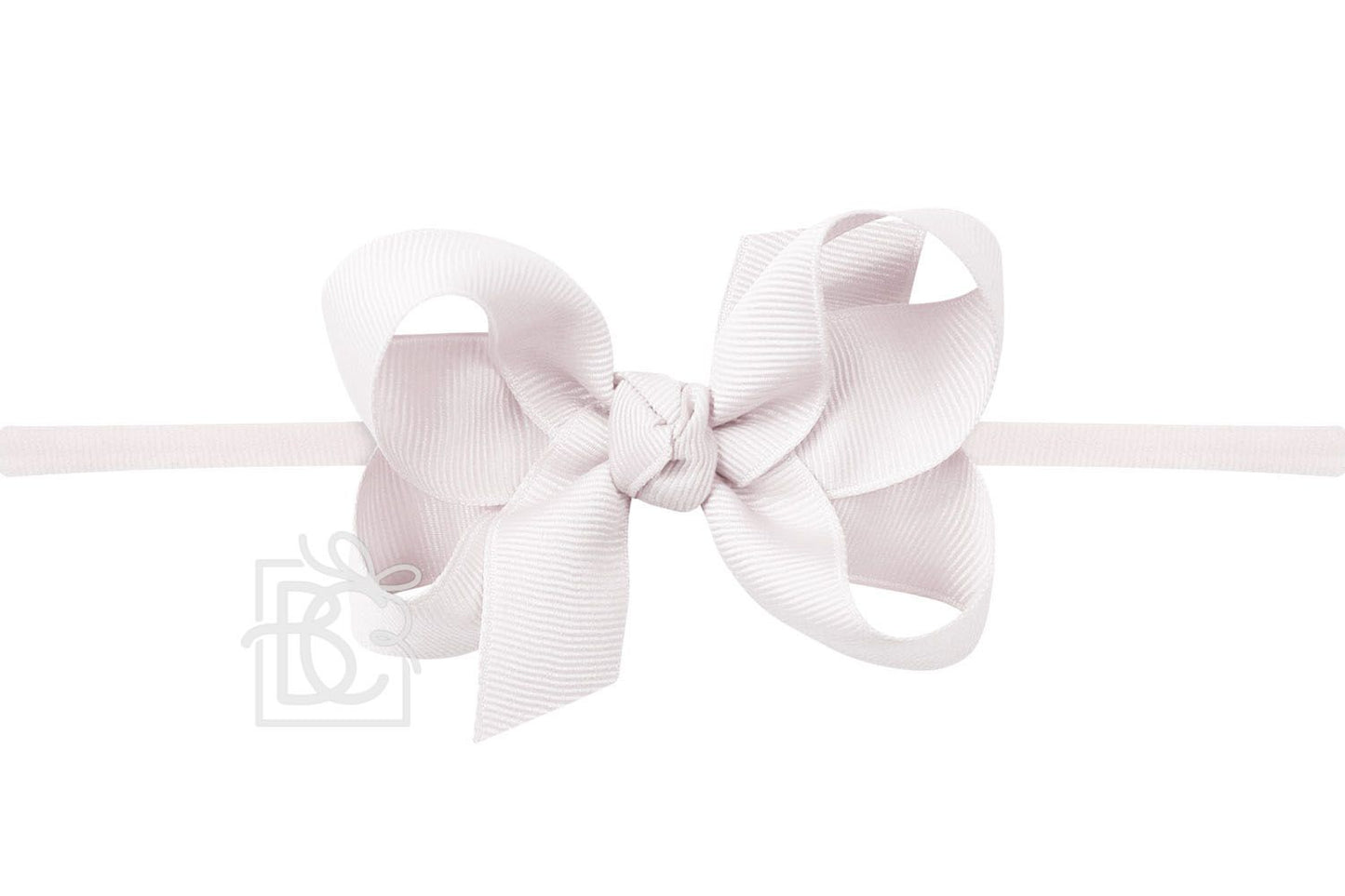Beyond Creations’ Quarter Inch Pantyhose Headband with our Signature Grosgrain Bow